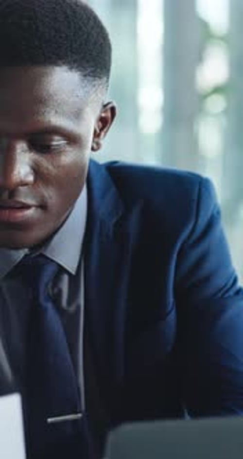 Corporate, business and black man on laptop in office for finance report