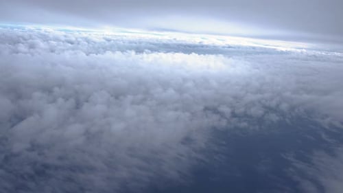 Aerial View of Fluffy White Clouds in Sky