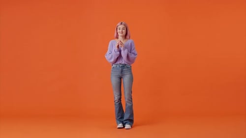 Uncertain Confused Female Shrugging with Shoulders in Studio