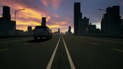 Driving Car on Highway at Sunset with City Skyline