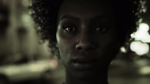 Subtle Light Moving Across Face in Dark Setting