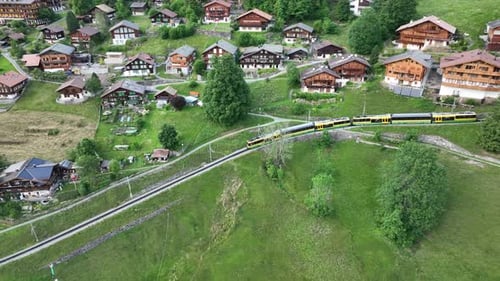 Aerial view of Swiss mountain train to Wengen - Jungfrau, Switzerland
