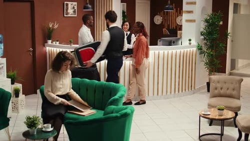 Hotel Manager Verifying Tourists Booking