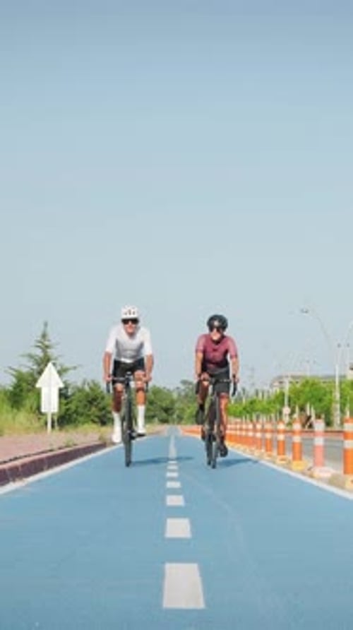 Cycling friends. Vertical video