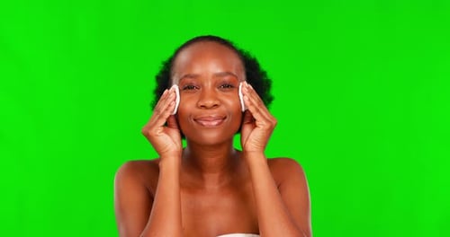 Beauty, black woman face and green screen with cotton pads for skincare and dermatology