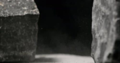 Impact Collection: Effect of a concrete brick breaking into two parts