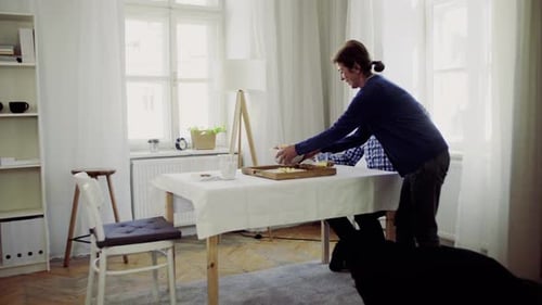 Loving Senior Couple Shares a Meal at Home