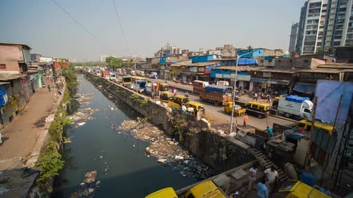 Daytime Traffic in a Poor Area of Mumbai Dharavi