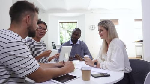 Diverse Team Collaborating in Modern Office Space