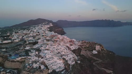 Stunning Sunset Over Oia, Santorini – Aerial Drone Footage