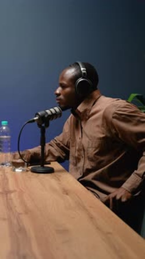 African Podcast Host Engaging in a Dynamic Discussion
