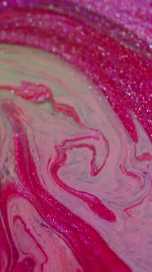 Swirling Glitter Paint Background with Fluid Texture