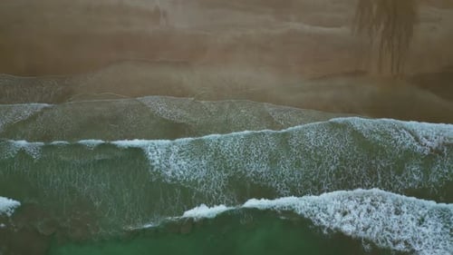 Sea Waves Breaking on Sand Beach