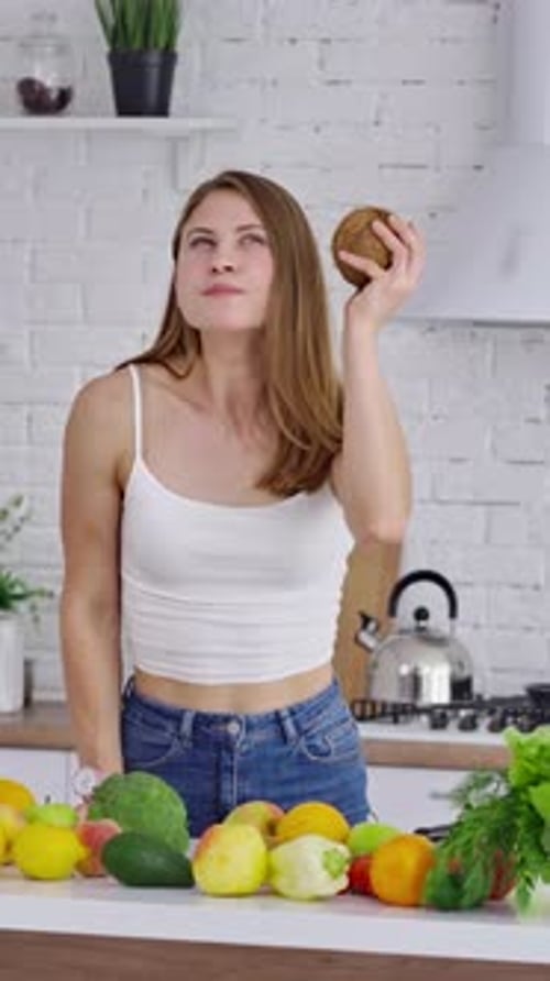 Woman Considers Healthy Recipe with Coconut