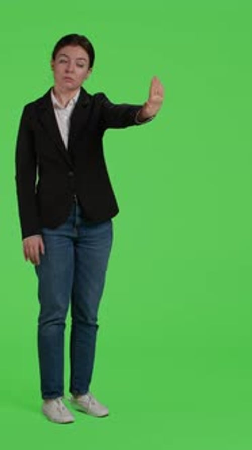 Vertical Video Side View of Businesswoman Doing No Sign with Palm on Camera
