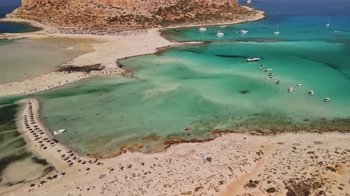 Aerial view of turquoise waters and sandy beaches in Balos Lagoon