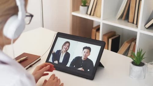 Virtual Meeting Via Tablet Display with Woman