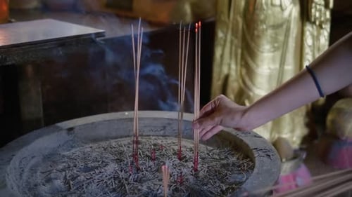 Place joss stick to the prayer platform