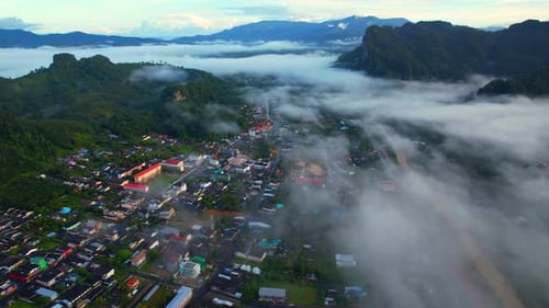 Drone flying over Phang Nga city in the tropical forest