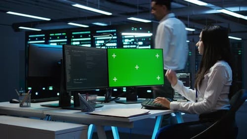 Technician Using Mockup Computer in Data Center