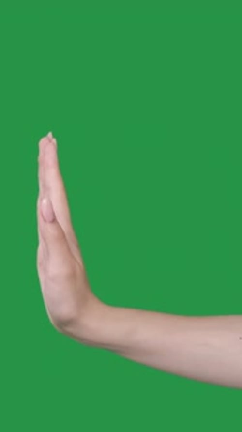 Hand Making Stop Gesture on Green Screen