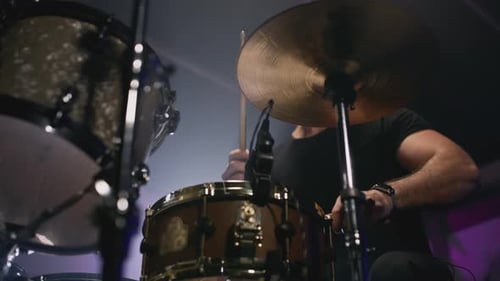 Musician Playing Drums in a Studio Close Up