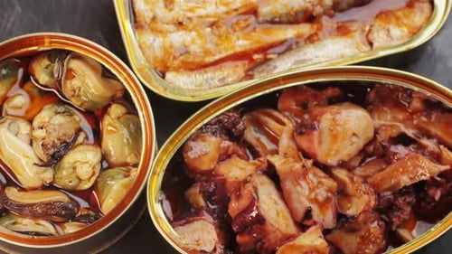 Canned Seafood: Mussels, Octopus, Sardines Close Up