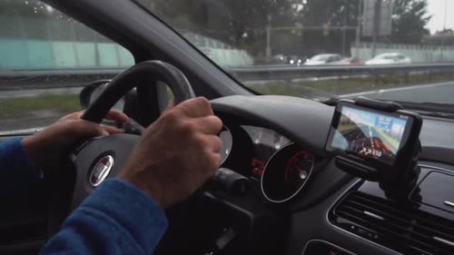 Driving with GPS Navigation System on Dashboard