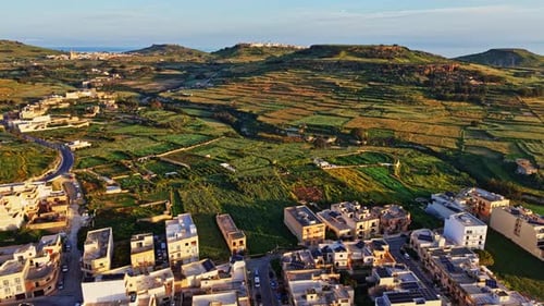 Scenic aerial view of Malta's lush countryside and coastal landscape