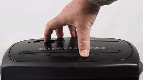 Paper Shredder Destroying CD Disc Close Up