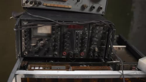 An Experienced Technician Dismantling And Renewing Obsolete Circuits And Elements In Vintage Radio