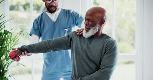 Physiotherapy, arm and dumbbell with a senior black man in a clinic for rehabilitation