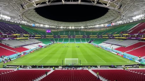 Scenic wide view of al Thumama stadium inside architectural design with white structure and red seat