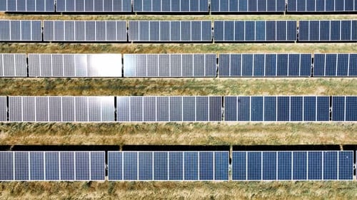 Aerial shot of a large field of solar panels
