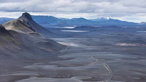 Aerial view of volcanic lake and mountains, Iceland.