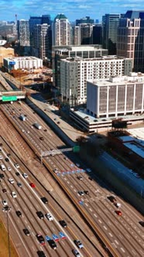 Flight above the highways with busy traffic. Top view on the downtown of Atlanta, Georgia, USA