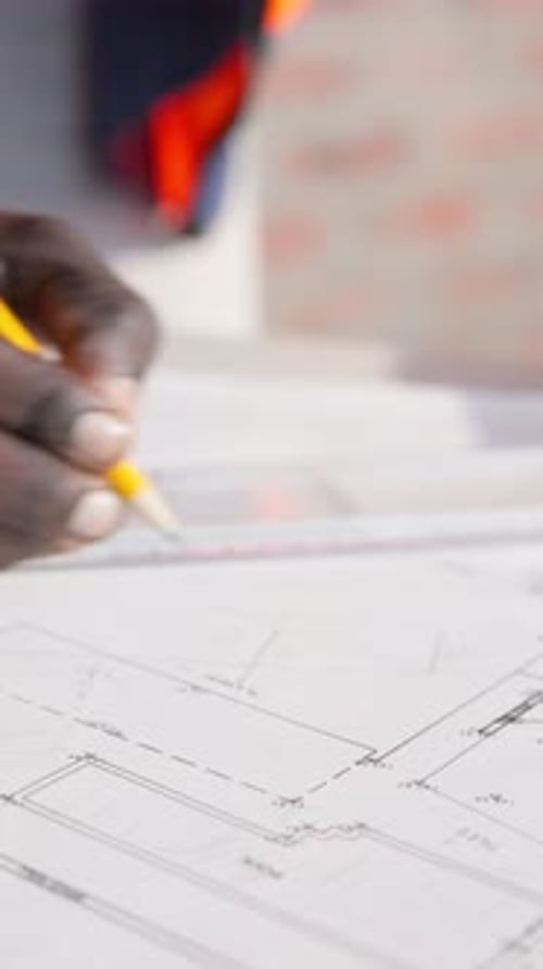 Architecture, writing and hands of person with blueprint, design and layout for building project