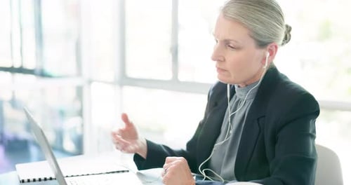 Business Woman in Online Meeting Using Laptop
