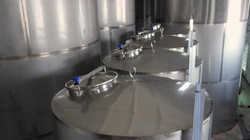 Stainless Steel Tanks of Distilling Unit at Winery or Brewery