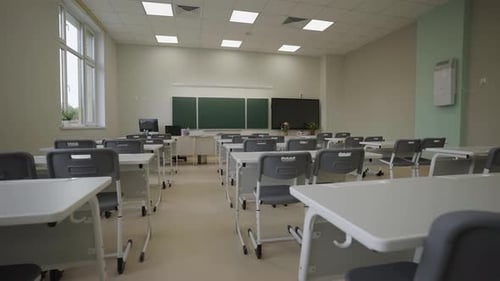 Empty Modern Classroom with Desks and Chairs