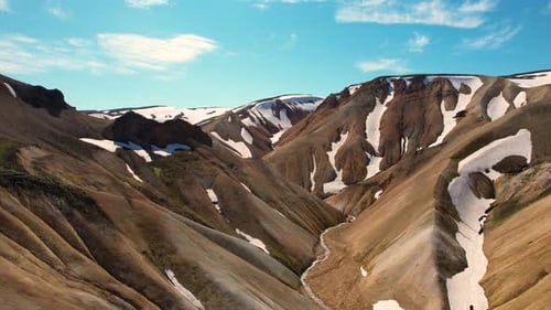 Beautiful Aerial Tour Landmannalaugar Iceland Mountain Snow Summer Day Blue Sky Clouds Red Brown San