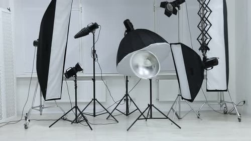 Professional lighting equipment in modern photo studio