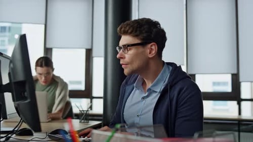 Software Engineer Working Office. Focused Man Developer Typing Desktop Computer. Professional It