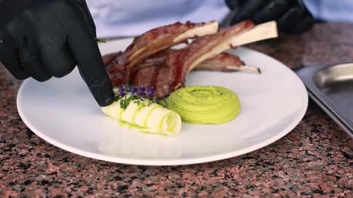 Lamb Chops and Puree on White Plate