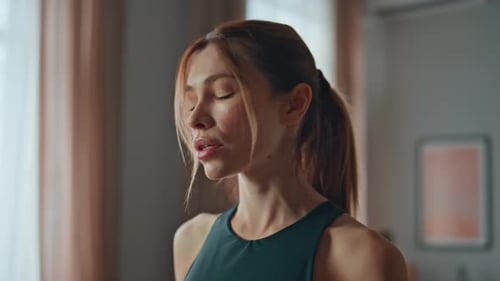 Fitness Girl Refreshing Water Looking on Smartphone Screen with Smile Close Up