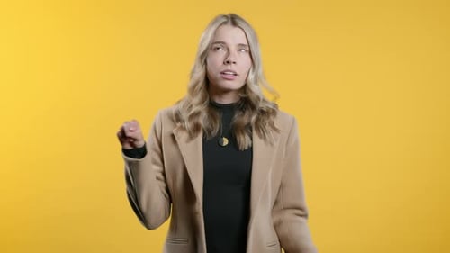 Woman Crossing Fingers and Making Peace Sign