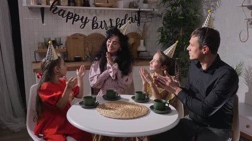 Family Celebrates Birthday Together at Home