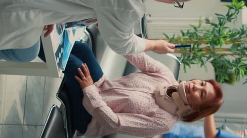 Doctor Consults with Patient in Waiting Room