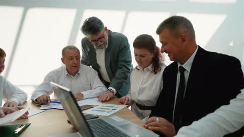 Business Team Discussing Project Strategy in Office Meeting