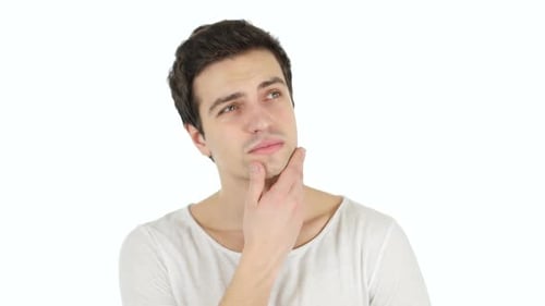 Young Man Thinking With Hand on Chin